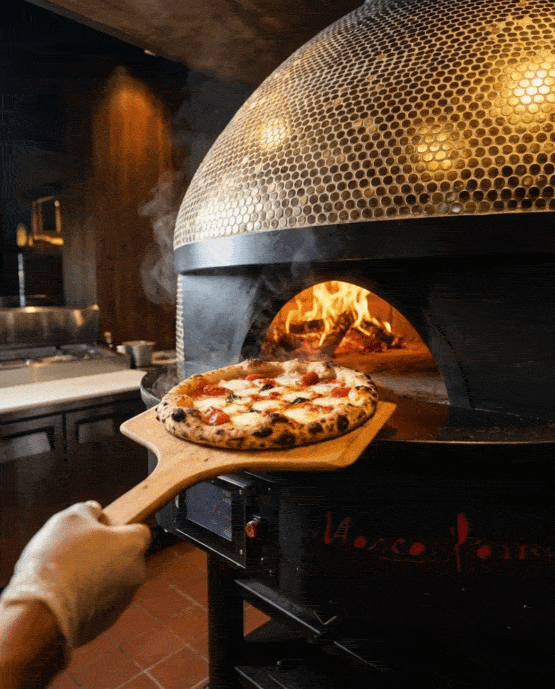 Neapolitan pizza pulled from the Marra Forni golden oven at 700°